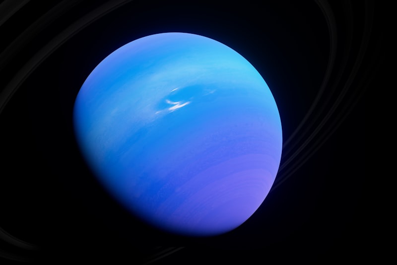 A bright planet shining over a dark landscape at night